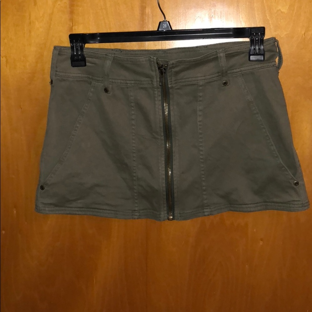 Dark green mini skirt